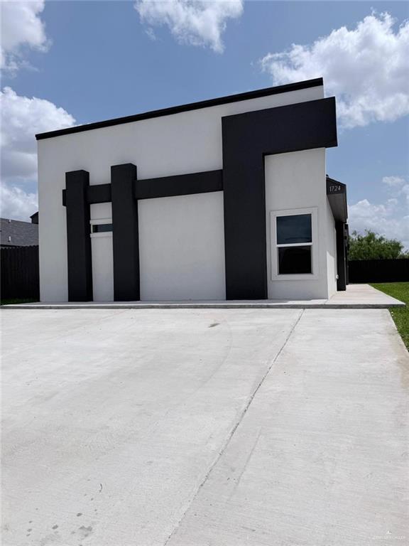 1724 Clinton Street Harlingen, TX 78550 - Photo 1 of 23 a front view of a building