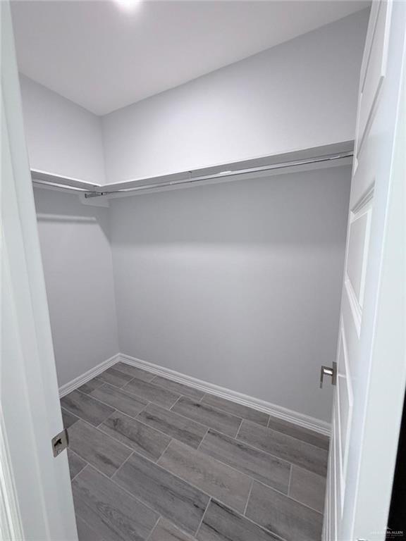 1724 Clinton Street Harlingen, TX 78550 - Photo 12 of 23 a view of an empty walk in closet