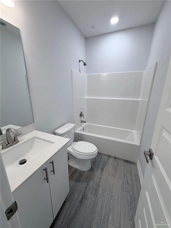 1724 Clinton Street Harlingen, TX 78550 - Photo 6 of 23 a bathroom with a sink a toilet and shower