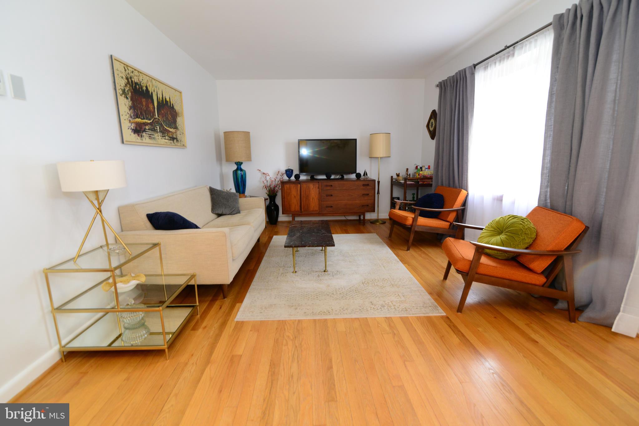 1205 June Road Baltimore, MD 21227 - Photo 5 of 36 Tons of natural light and gleaming hardwood floors