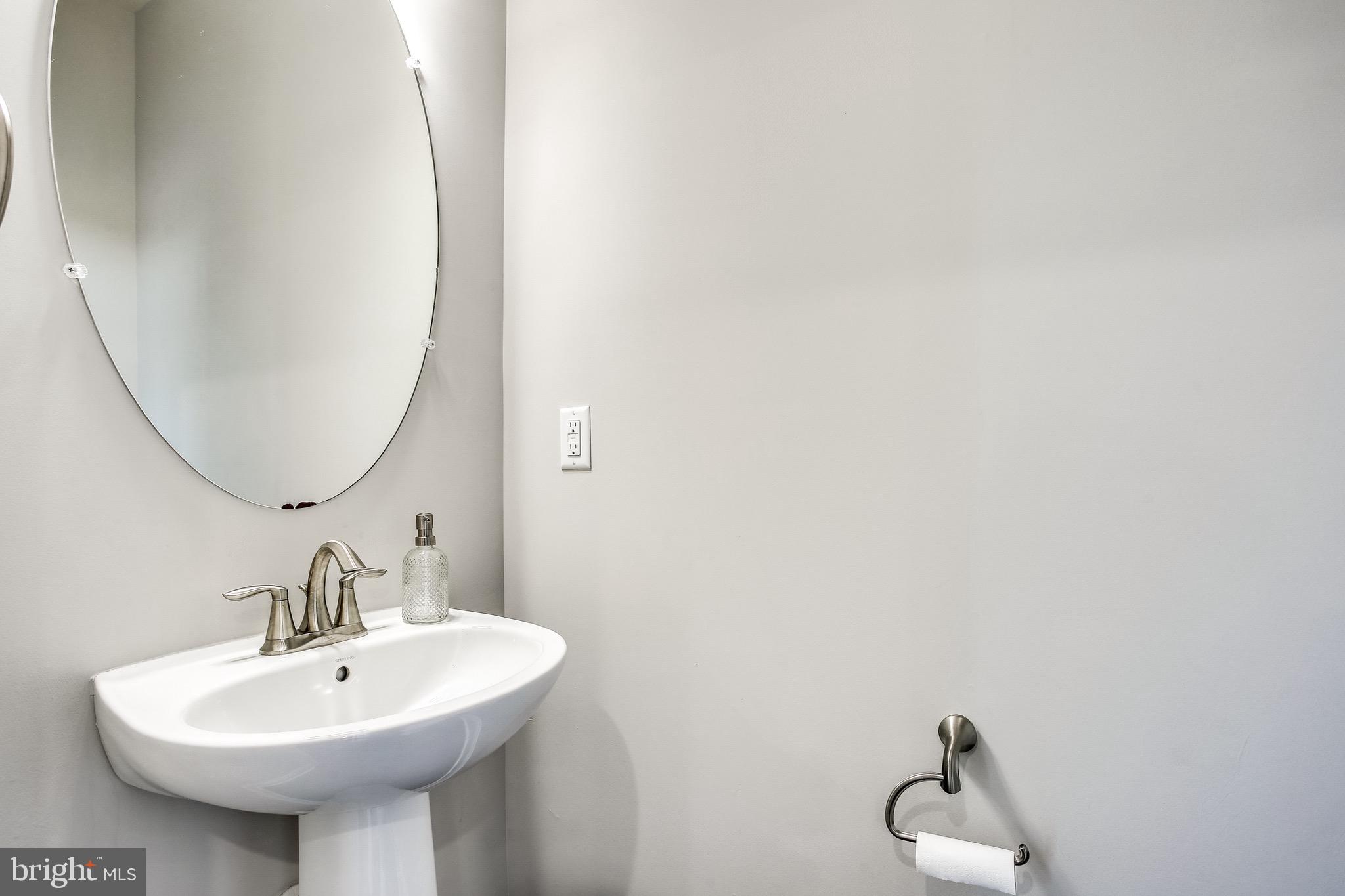 7034 Rackham Way Hanover, MD 21076 - Photo 13 of 42 Main Level Half Bathroom.