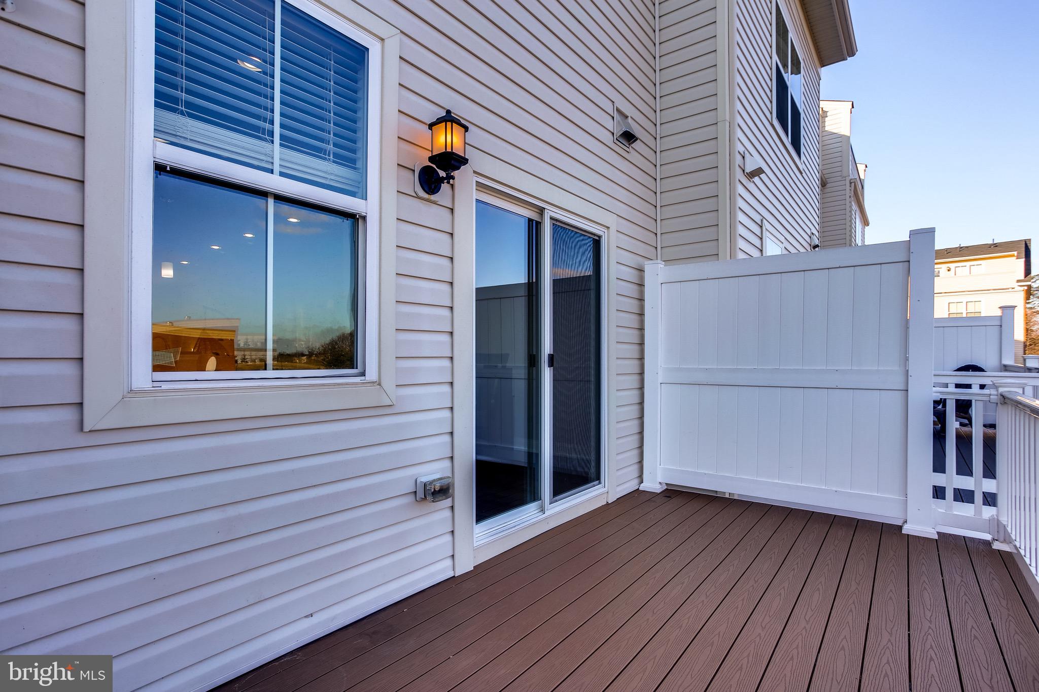 7034 Rackham Way Hanover, MD 21076 - Photo 15 of 42 Main Level Deck out of Dining Area.