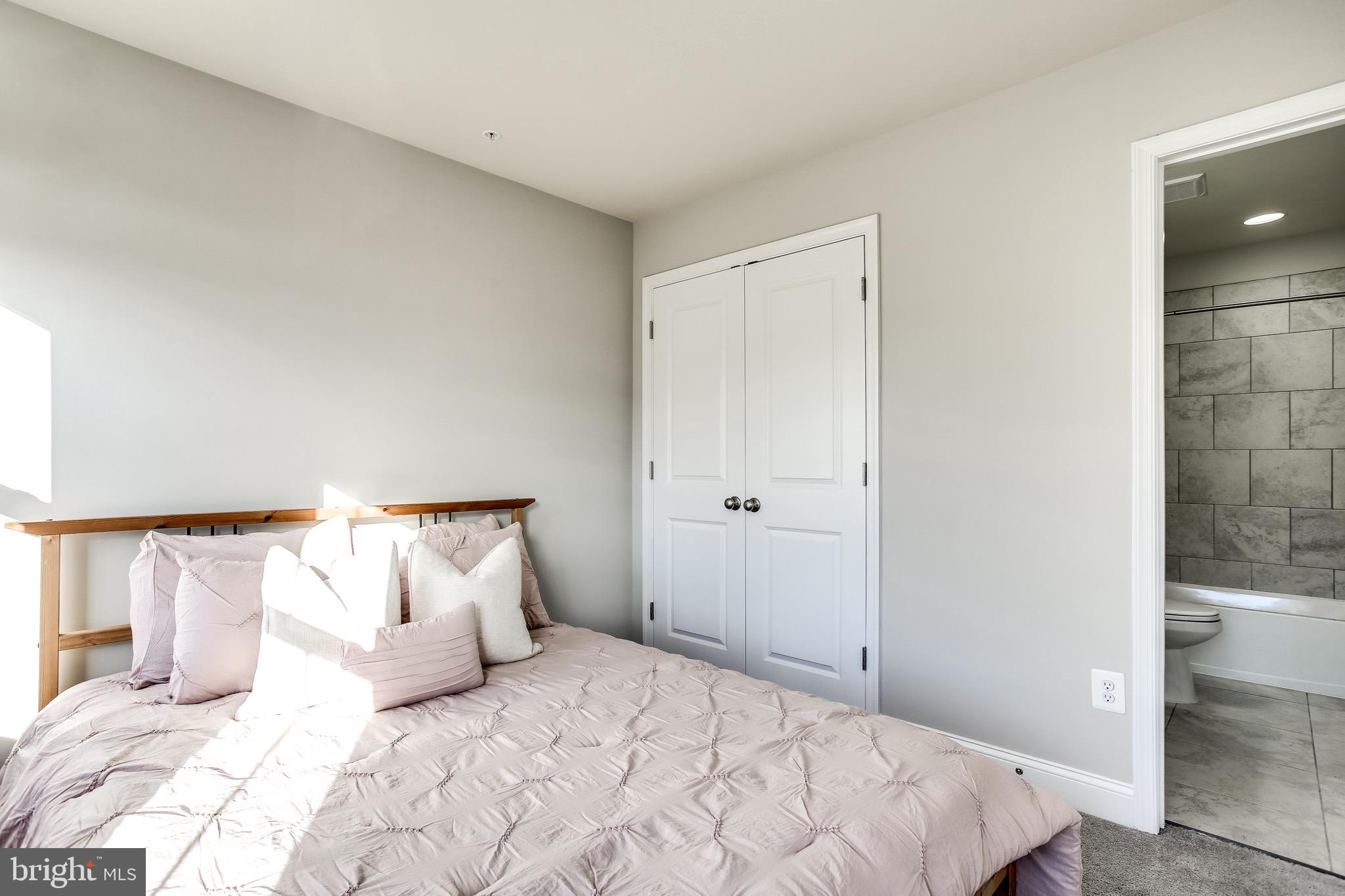 7034 Rackham Way Hanover, MD 21076 - Photo 22 of 42 Bedroom #2 | Window Treatments | Ensuite Bathroom.
