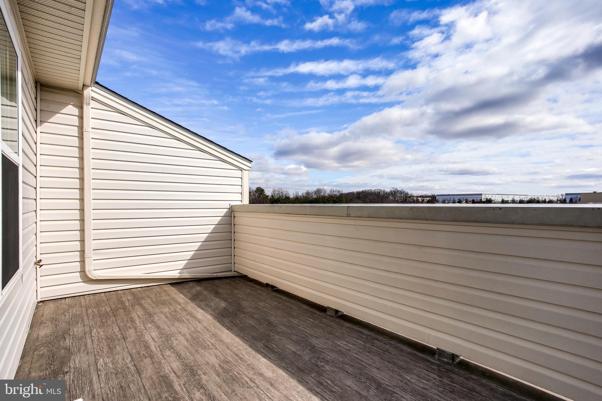 7034 Rackham Way Hanover, MD 21076 - Photo 32 of 42 Serene Rooftop Deck.