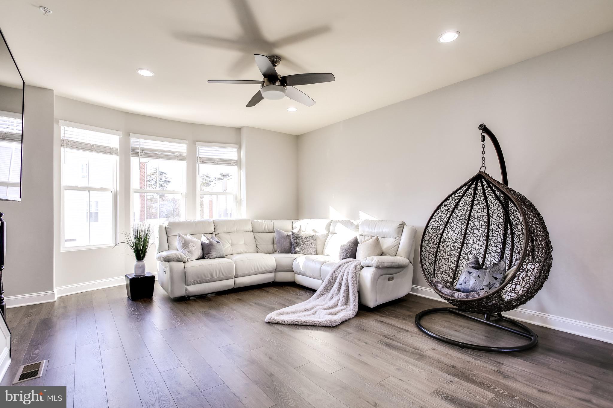 7034 Rackham Way Hanover, MD 21076 - Photo 4 of 42 Family Area | Ceiling Fans | Windows Galore.