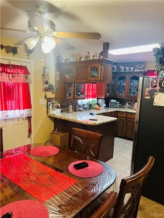a dinning table and chairs in a room