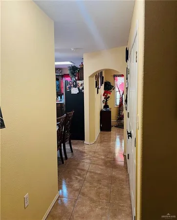 a room with furniture and a flat screen tv