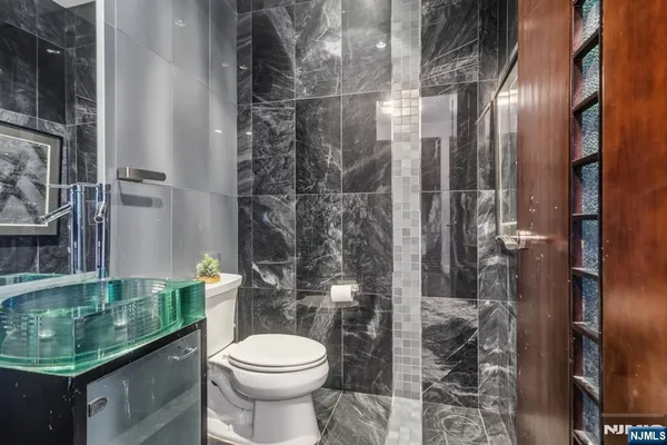 a bedroom with bed and window