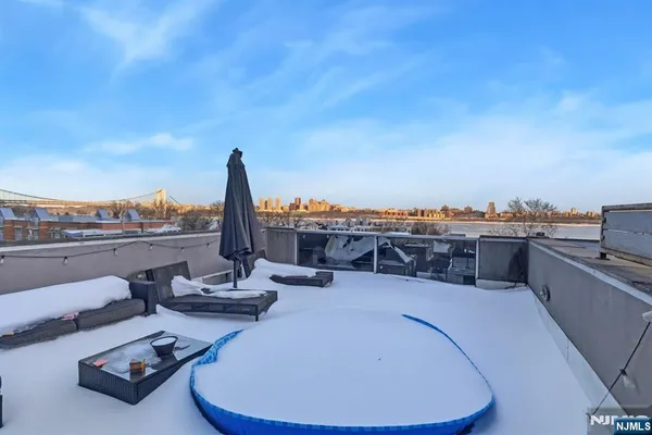 a bathroom with a double vanity sink toilet and shower