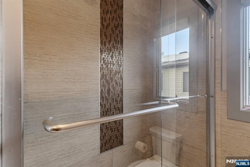 760 Undercliff Avenue Edgewater, NJ 07020 - Photo 32 of 48 a bathroom with a shower