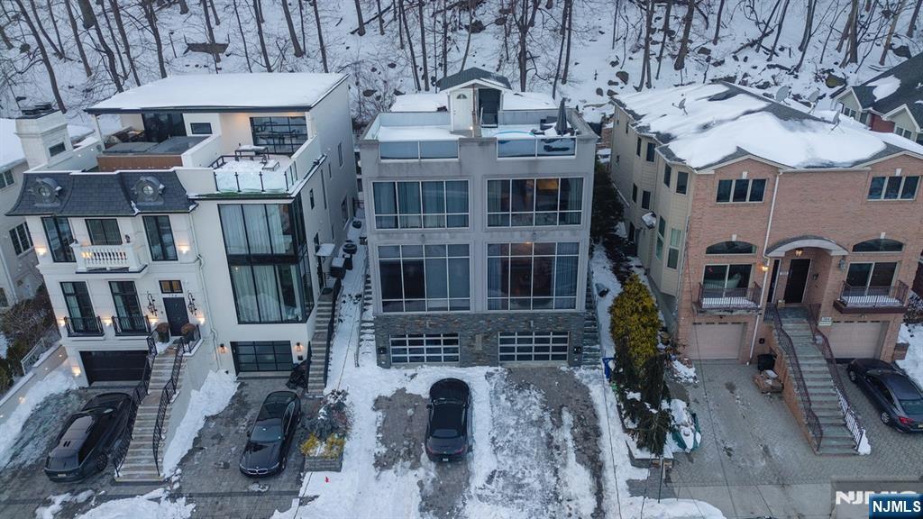 760 Undercliff Avenue Edgewater, NJ 07020 - Photo 33 of 48 a front view of a building with glass windows
