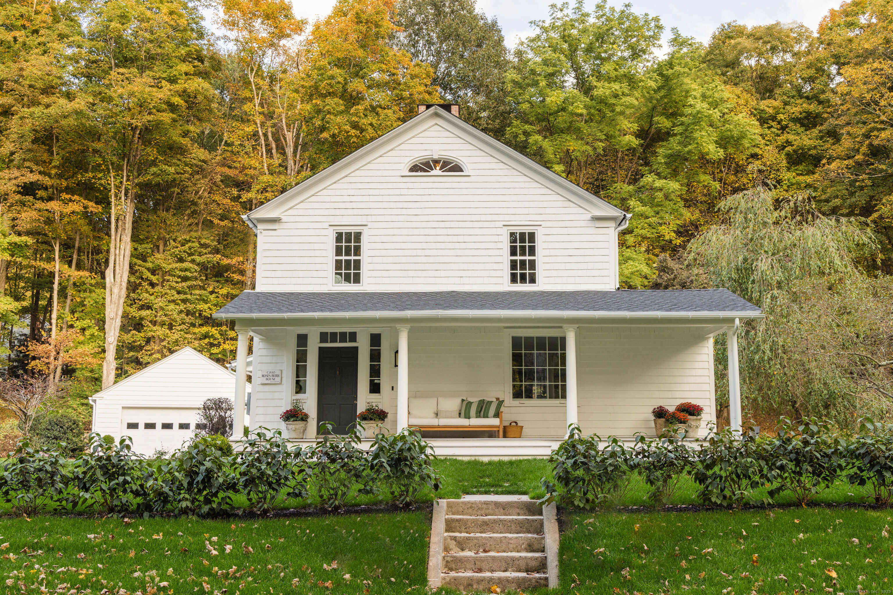 front view of a house with a yard