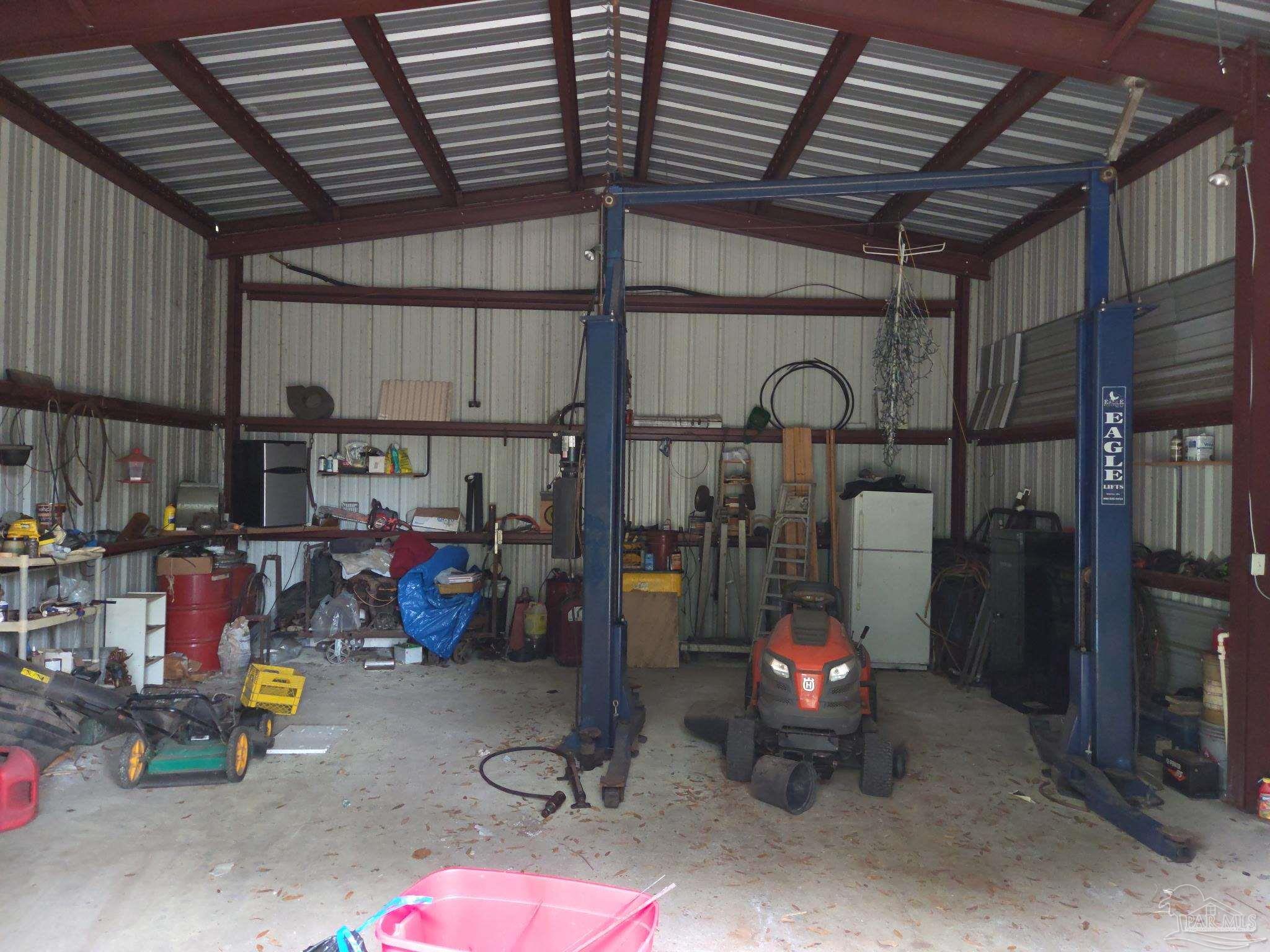 7991 Old Hickory Hammock Road Milton, FL 32583 - Photo 2 of 42 a view of storage and utility room