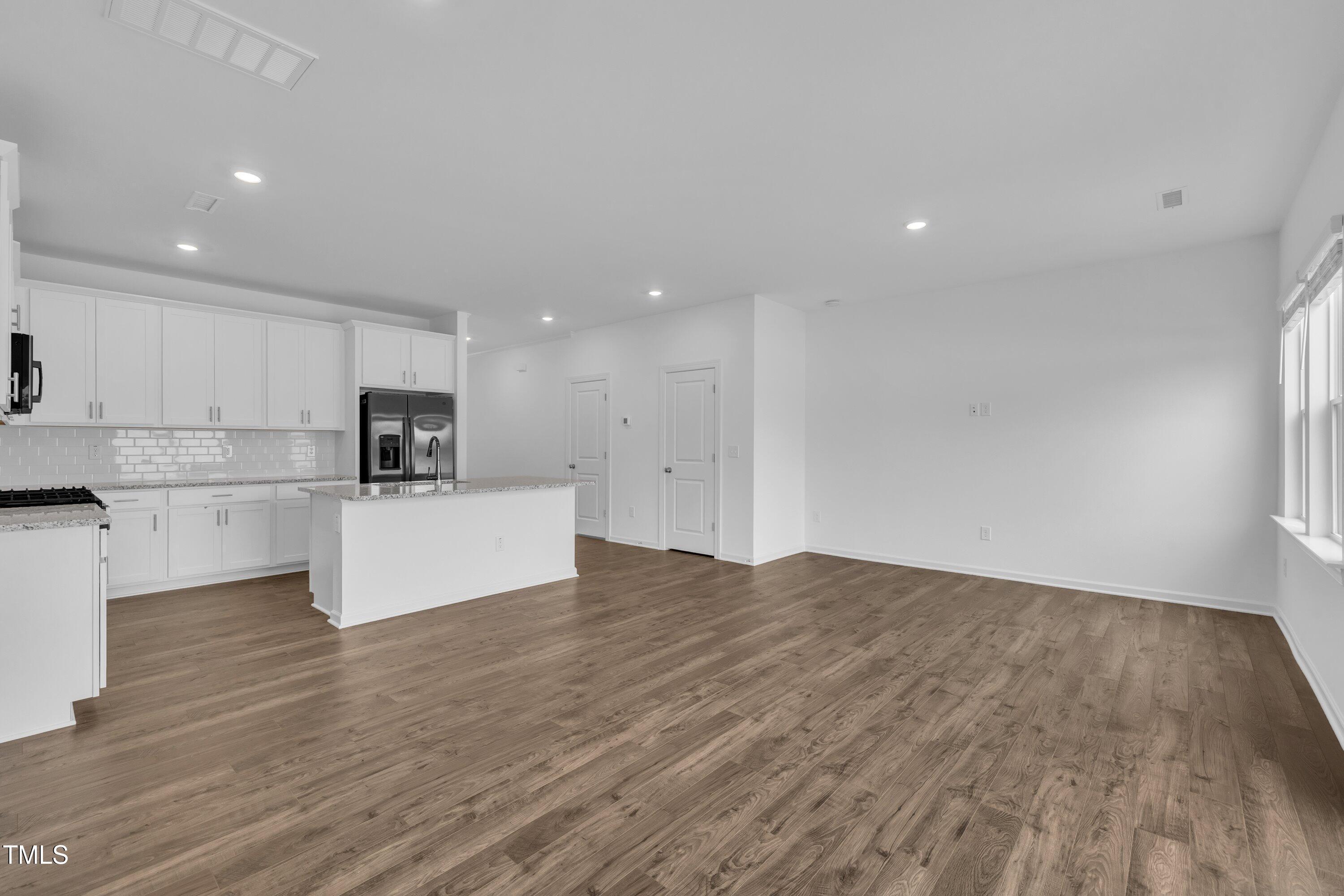281 Hank Way Angier, NC 27501 - Photo 18 of 39 a view of kitchen with microwave and cabinets