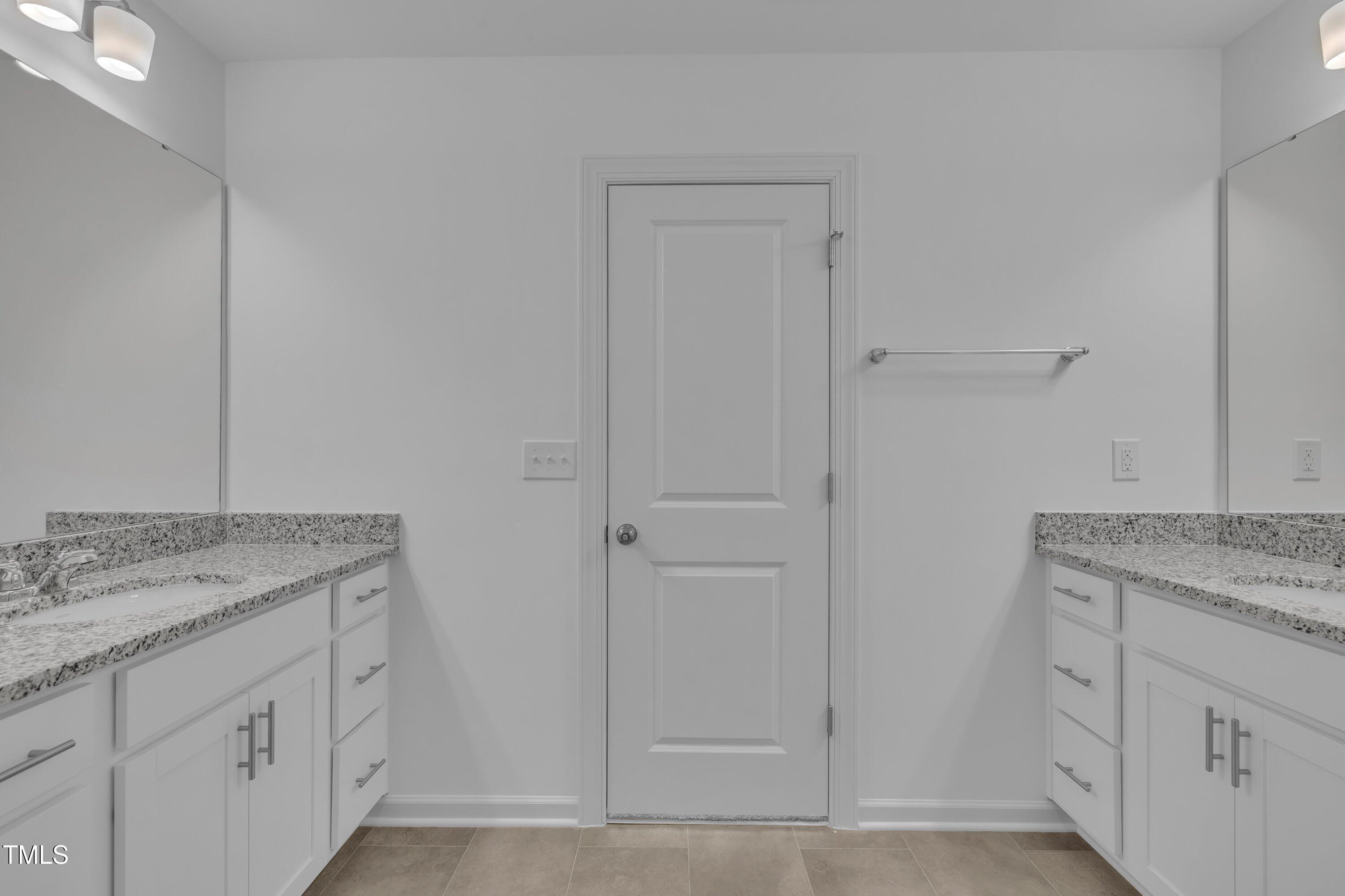 281 Hank Way Angier, NC 27501 - Photo 26 of 39 a view of cabinets with wooden floor