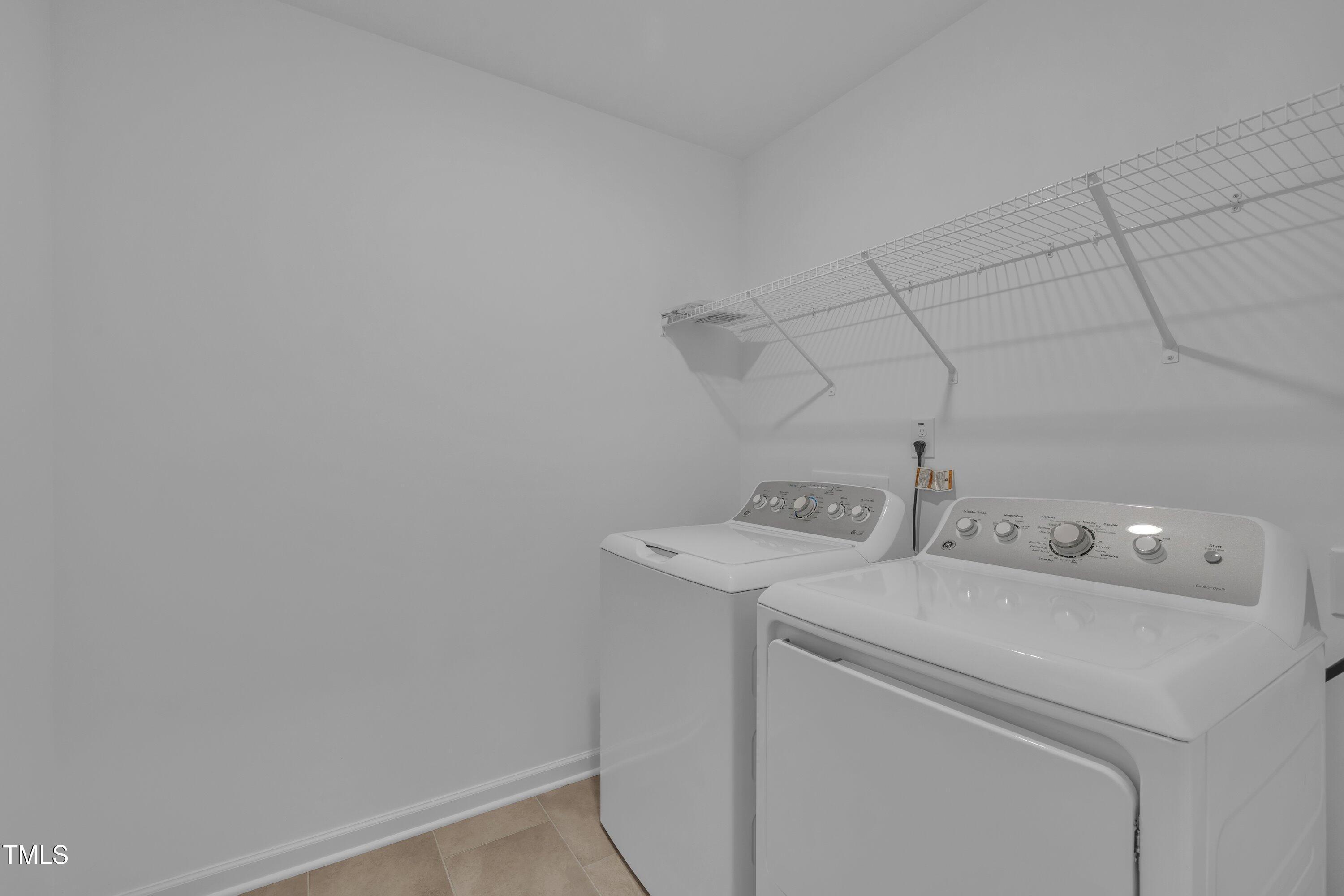 281 Hank Way Angier, NC 27501 - Photo 29 of 39 a utility room with dryer and washer