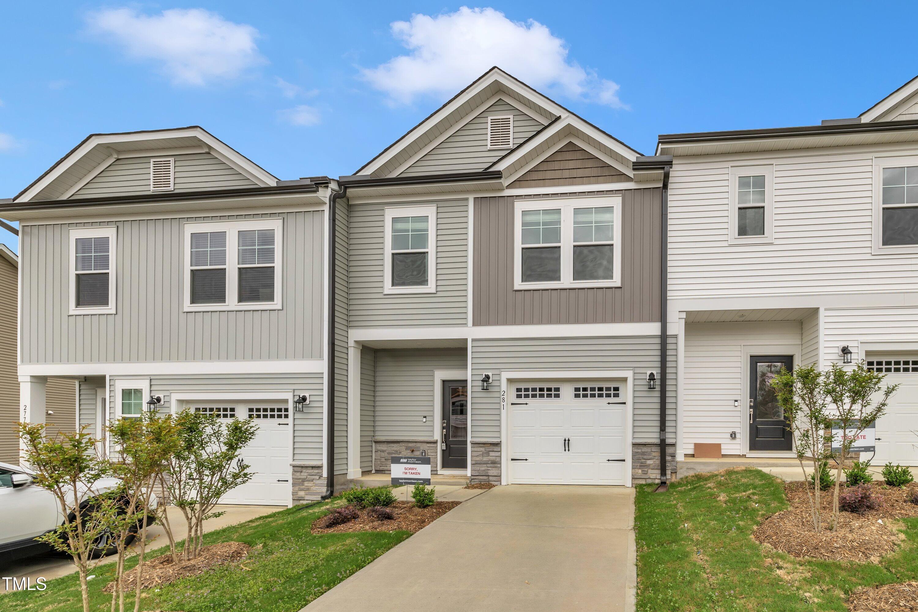 281 Hank Way Angier, NC 27501 - Photo 4 of 39 front view of a house with a yard