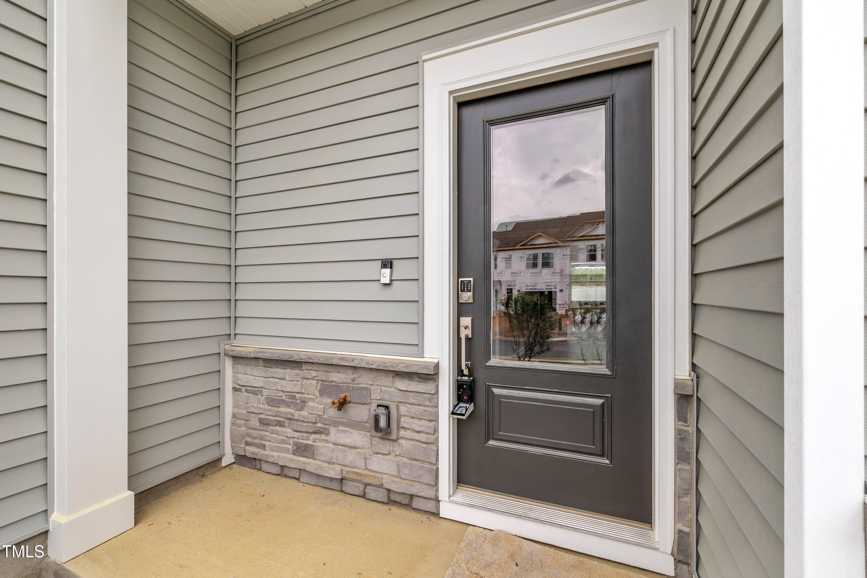 281 Hank Way Angier, NC 27501 - Photo 5 of 39 a view of front door of house