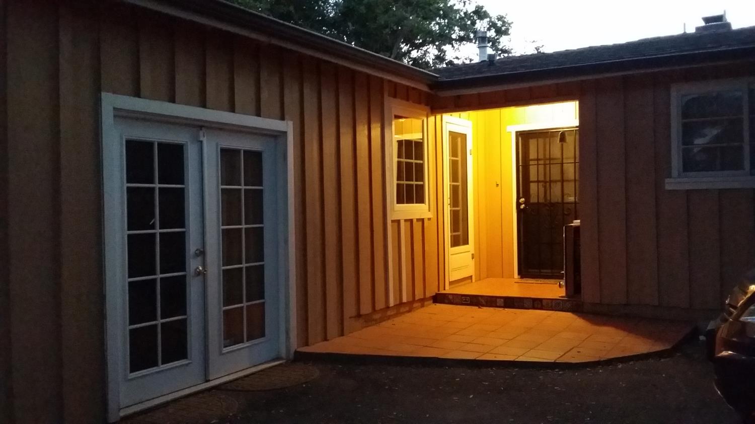 401 Burnham Road Oak View, CA 93022 - Photo 2 of 5 an outdoor space with sliding door and wooden floor