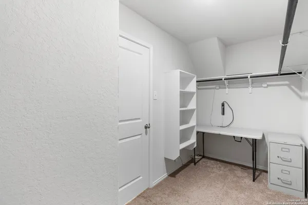 a view of a walk in closet