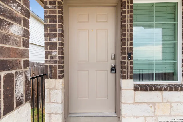 a view of door with glass door
