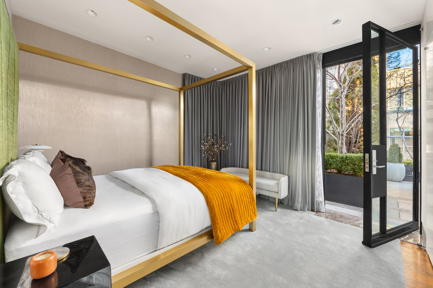 459 West Broadway, Unit PHS Manhattan, NY 10012 - Photo 11 of 17 a bedroom with a large bed and a chandelier