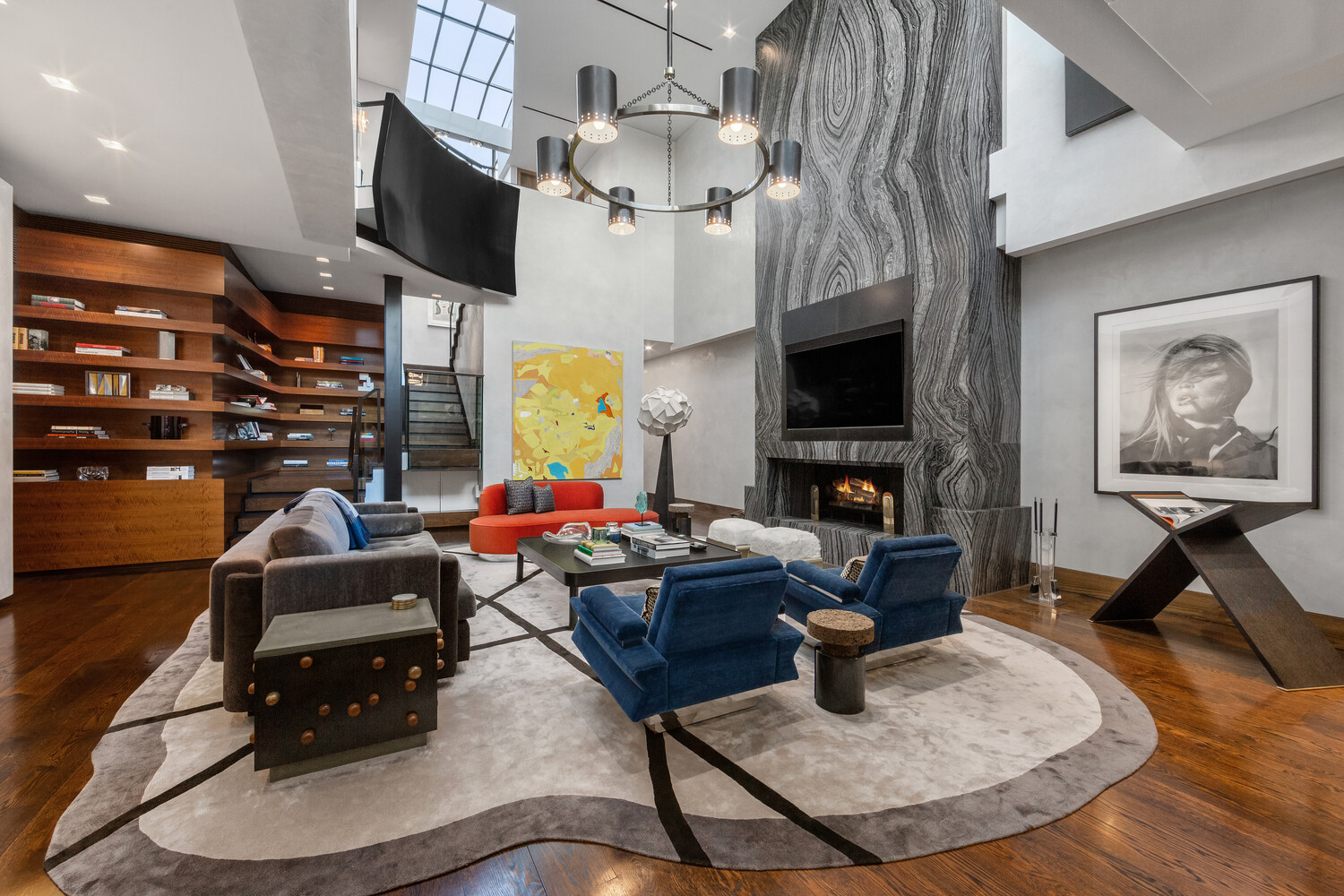 459 West Broadway, Unit PHS Manhattan, NY 10012 - Photo 3 of 17 a living room with furniture and a fireplace