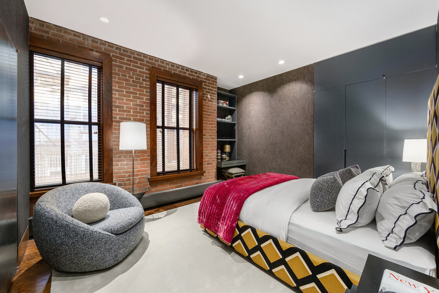 459 West Broadway, Unit PHS Manhattan, NY 10012 - Photo 9 of 17 a bedroom with bed and a large window