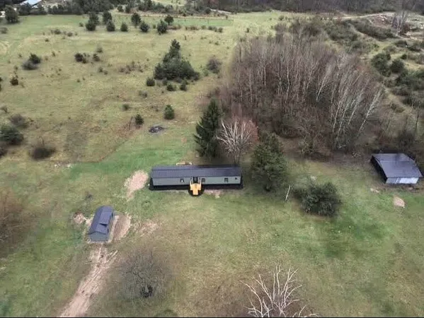 $219,900 | 1595 North County Line Road, Six Lakes, MI 48886