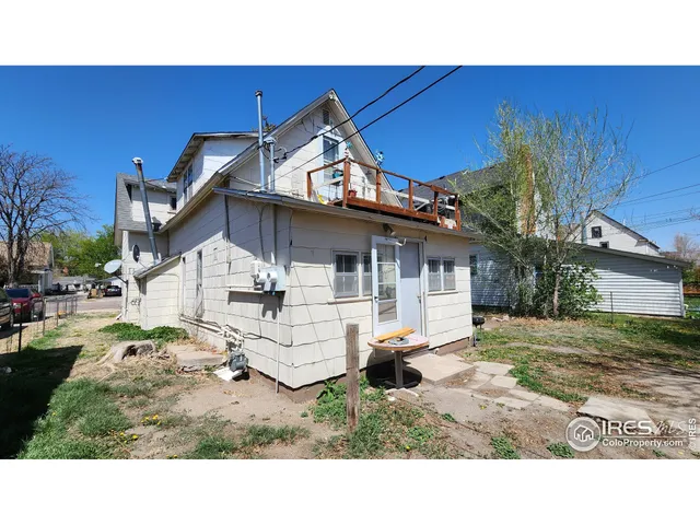 a view of a house with a patio