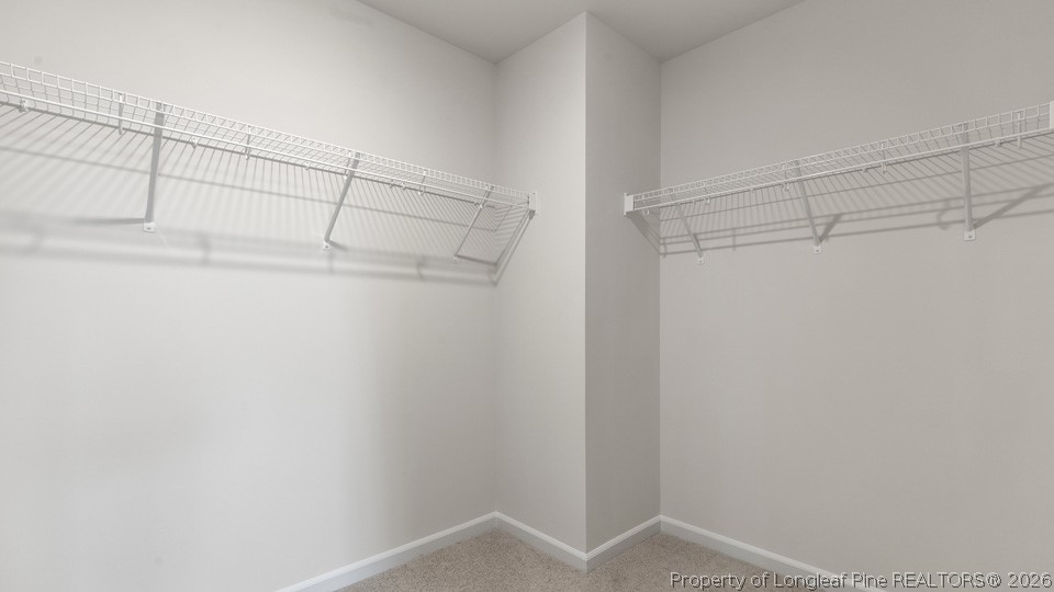 81 Discovery Way Spring Lake, NC 28390 - Photo 27 of 32 a view of a room with racks on the wall