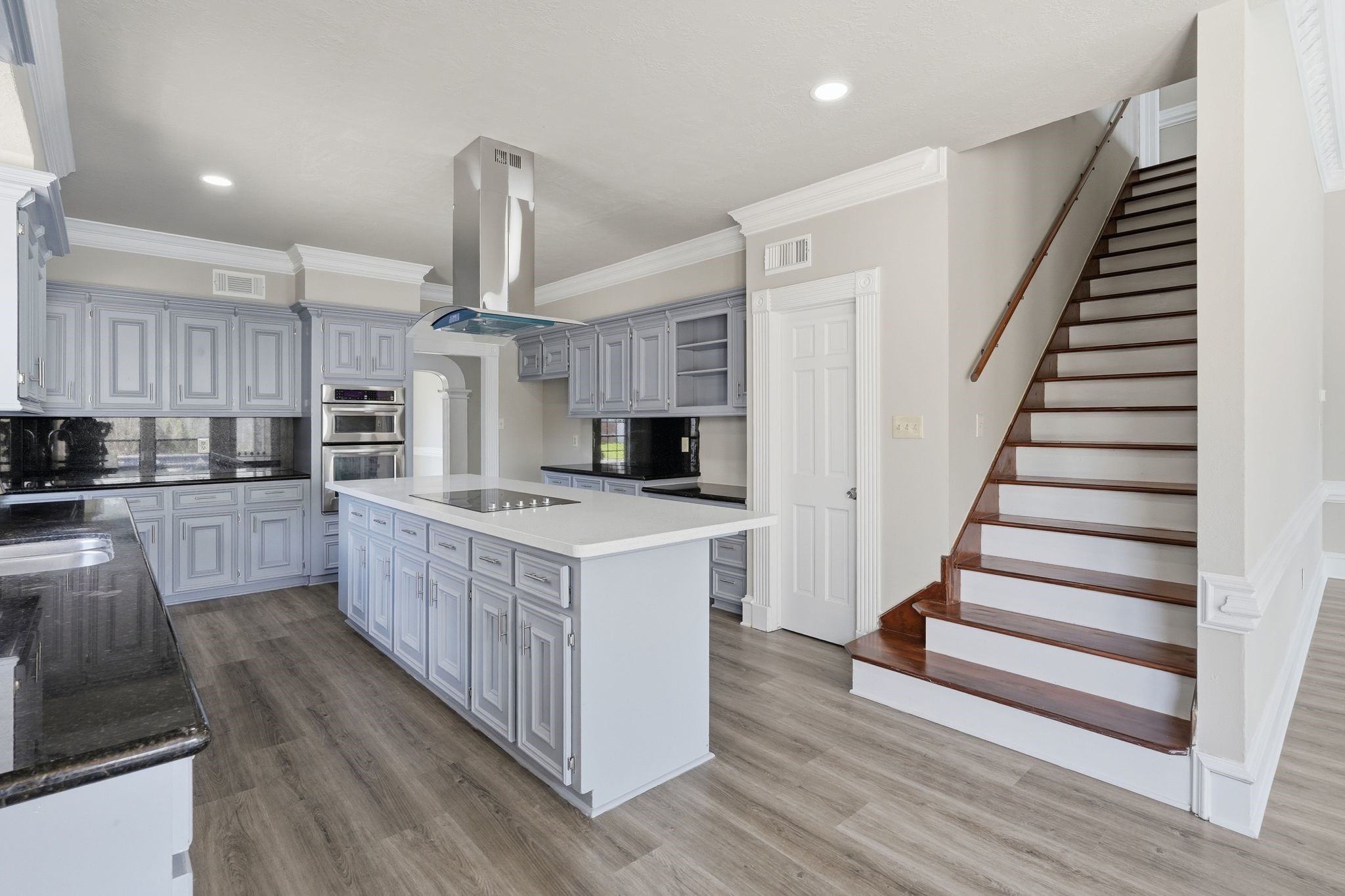 7611 Naremore Drive Spring, TX 77379 - Photo 13 of 48 The second staircase offers convenience for everyone upstairs!