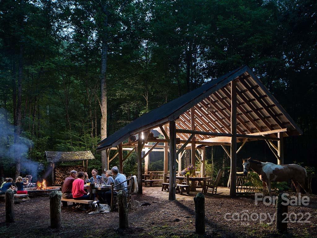 220 Cook House Road, Unit 220 Sylva, NC 28779 - Photo 15 of 17 a view of an chairs and table in the patio