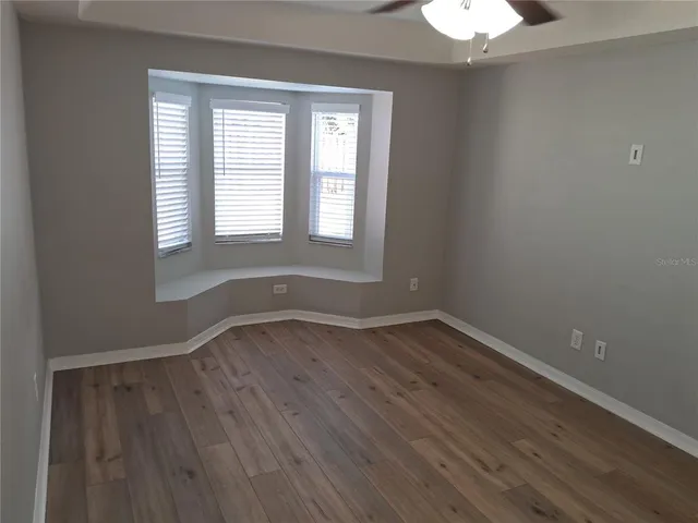 a view of an empty walk in closet