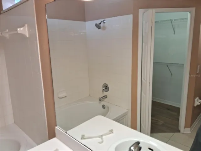 a bathroom with a toilet and a sink
