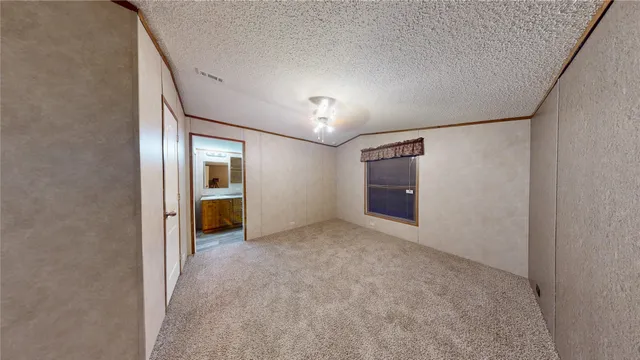 a view of a hallway with an entryway