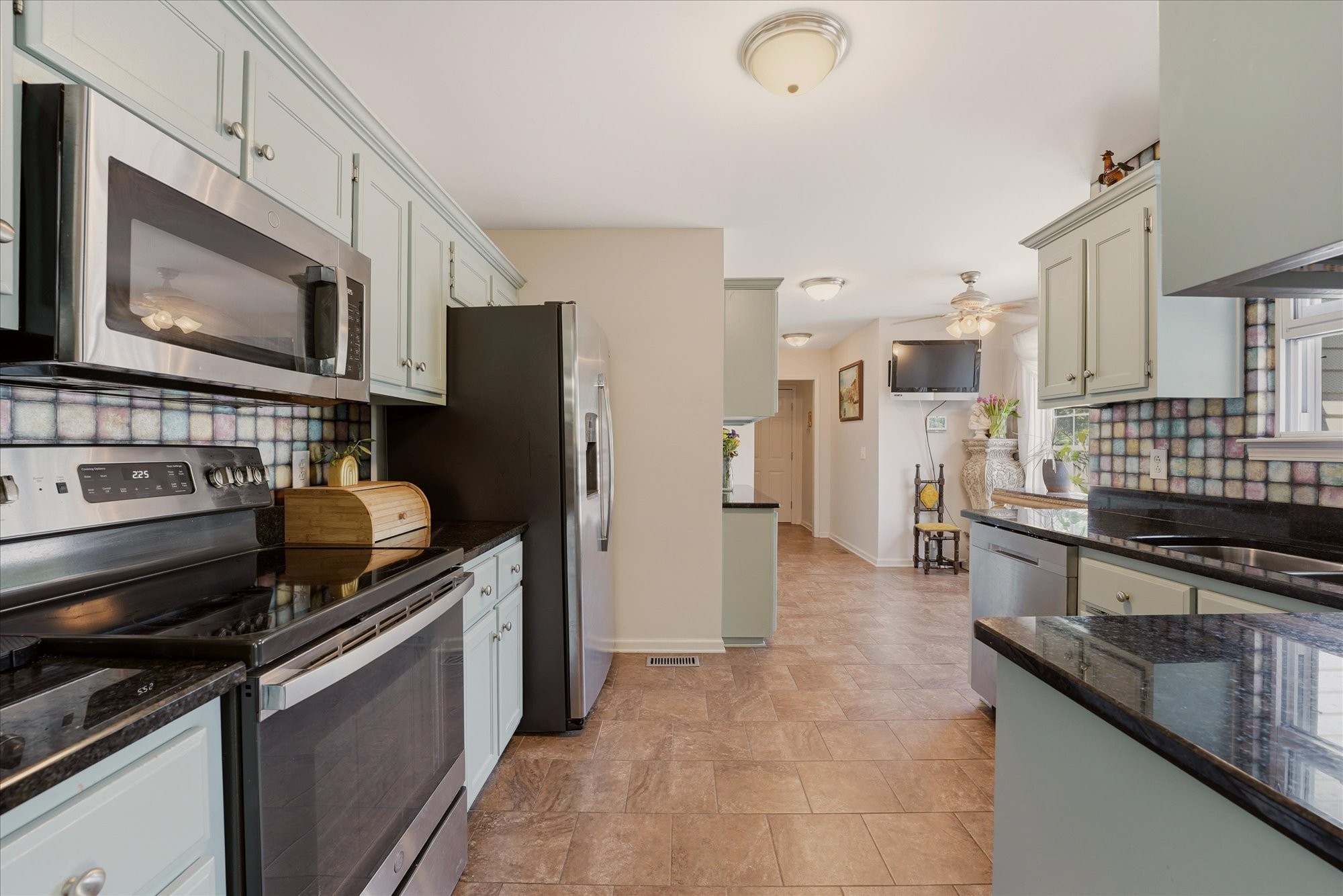 1510 Rapids Road Portland, TN 37148 - Photo 11 of 57 a kitchen with a stove and a microwave