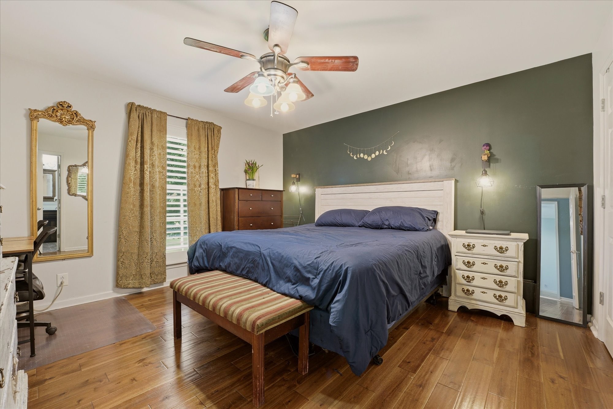 1510 Rapids Road Portland, TN 37148 - Photo 21 of 57 a bedroom with a bed and wooden floor