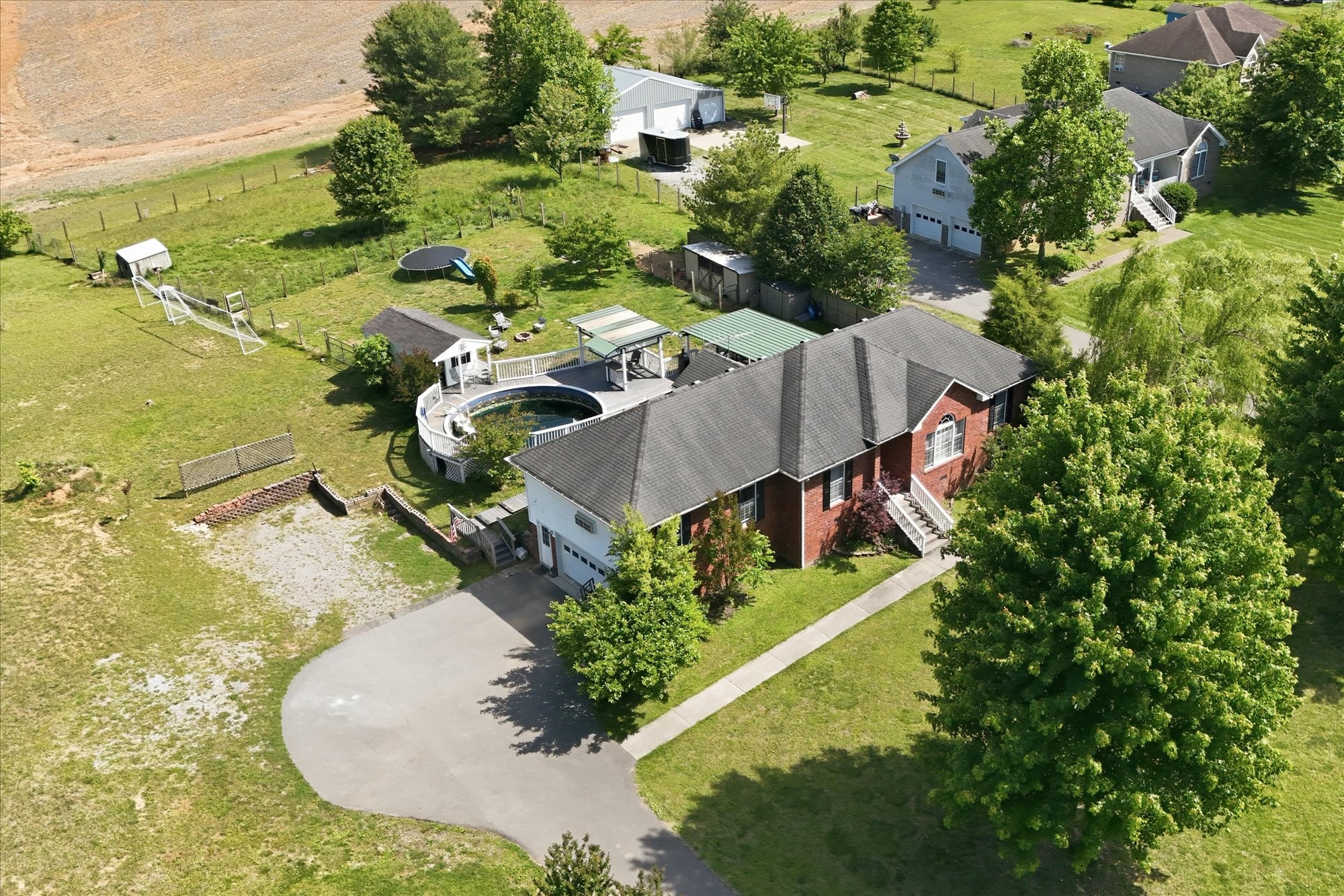 1510 Rapids Road Portland, TN 37148 - Photo 45 of 57 an aerial view of a house with a yard and lake view