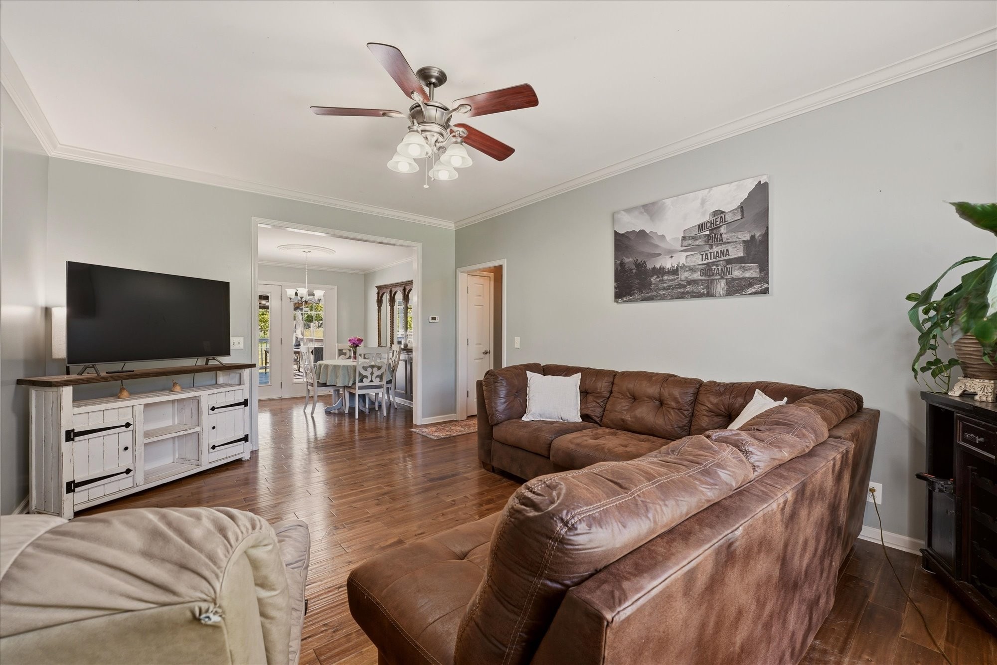 1510 Rapids Road Portland, TN 37148 - Photo 8 of 57 a living room with furniture and a flat screen tv