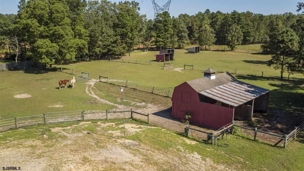 2183 Broadlane Road Williamstown, NJ 08094 - Photo 24 of 25 View of Grounds including 3-stall Barn, 3 Paddocks w/Lean-tos & Solar Fencing, Shed & 5 wooded acres