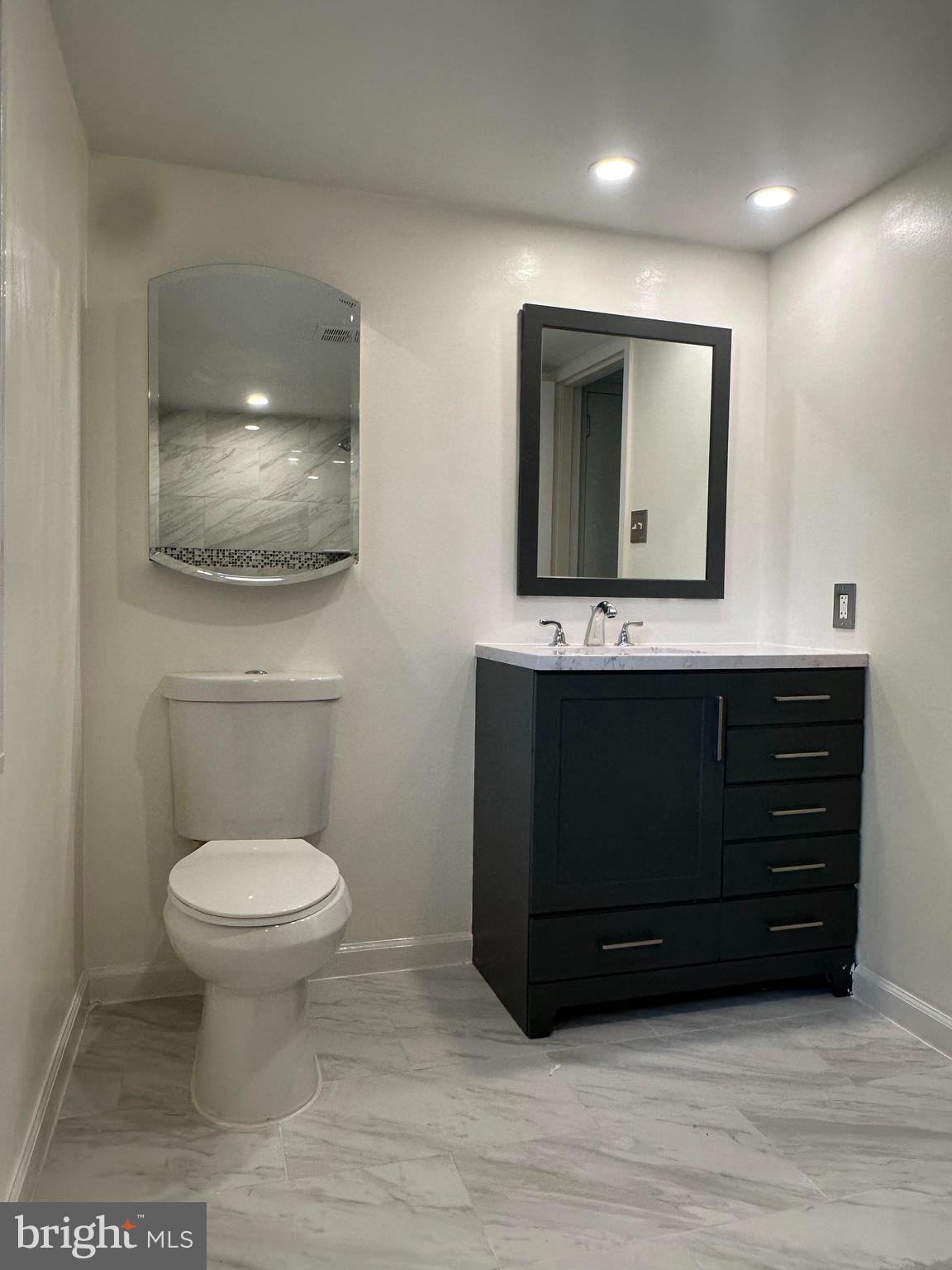 1418 Northgate Square, Unit 2C Reston, VA 20190 - Photo 10 of 13 Modern Bathroom