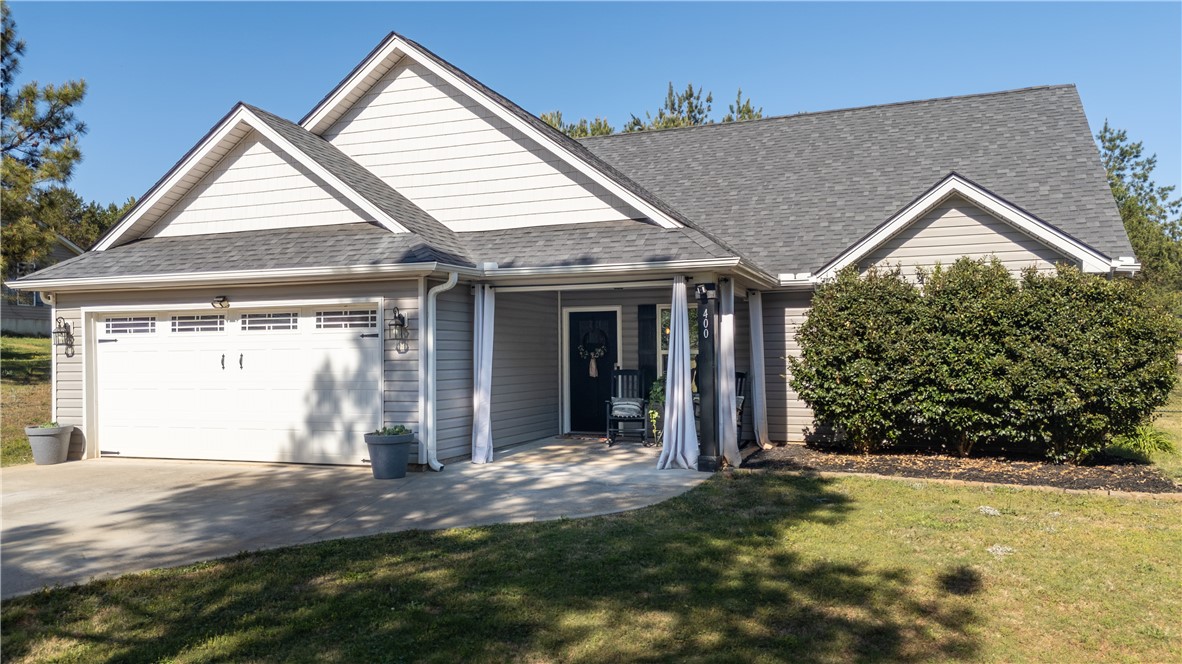 400 Green View Court Westminster, SC 29693 - Photo 3 of 33 This charming home offers curb appeal with a well-maintained exterior and inviting front porch.