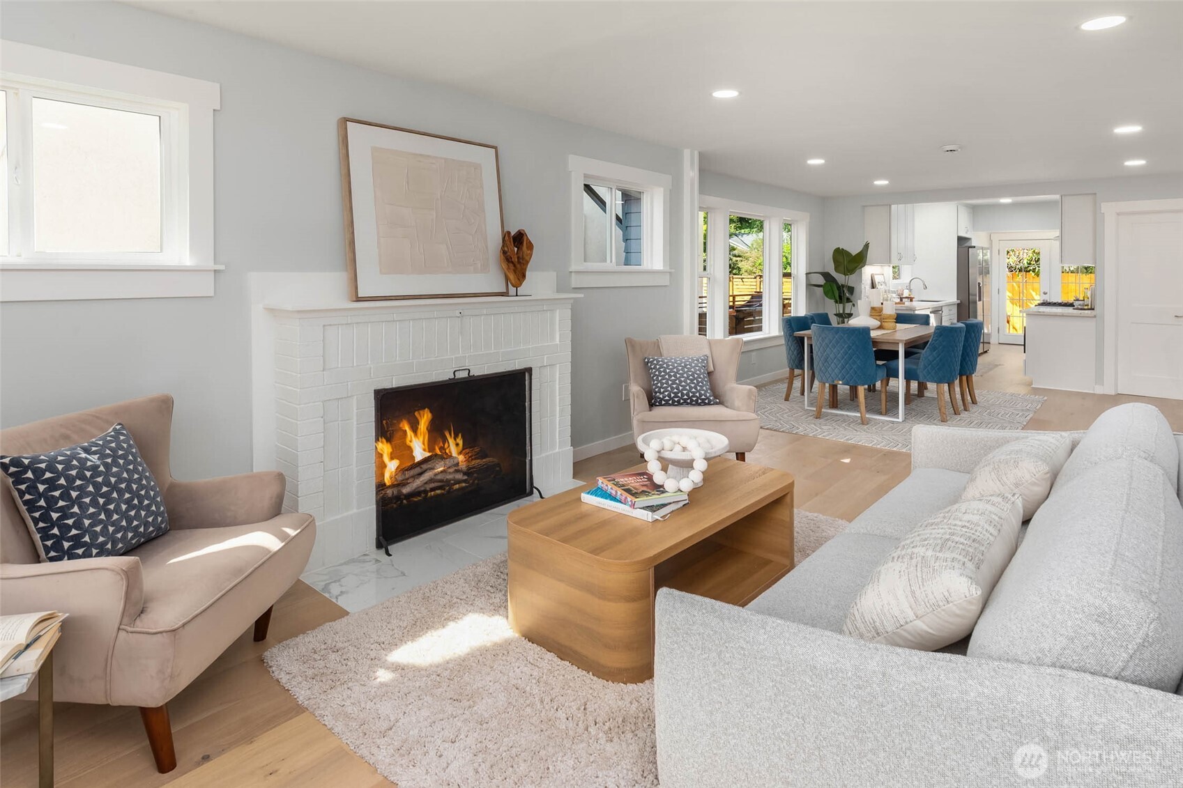 1312 Northeast 70th Street Seattle, WA 98115 - Photo 6 of 36 a living room with furniture and a fireplace