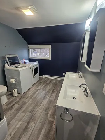 a bathroom with a sink and mirror