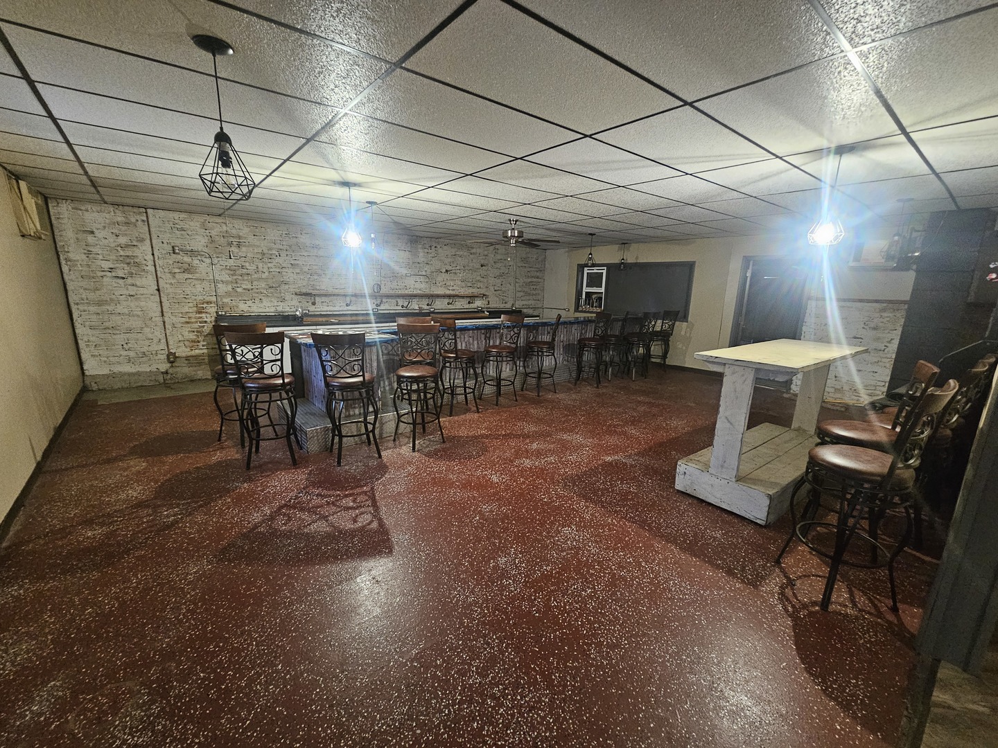 106 North Main Street Tampico, IL 61283 - Photo 8 of 16 a view of a chairs and table in a room