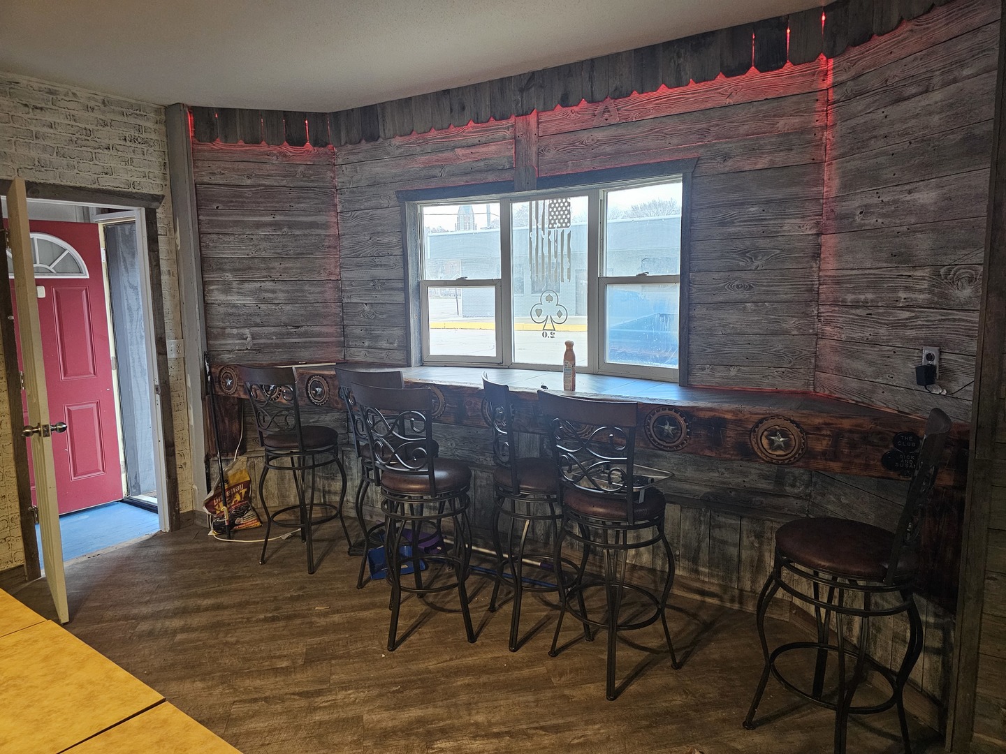 106 North Main Street Tampico, IL 61283 - Photo 10 of 16 a view of a dining room with furniture and a window
