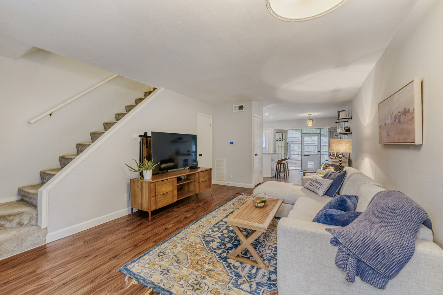 1912 Lightsey Road, Unit 6 Austin, TX 78704 - Photo 4 of 27 a living room with furniture and a flat screen tv
