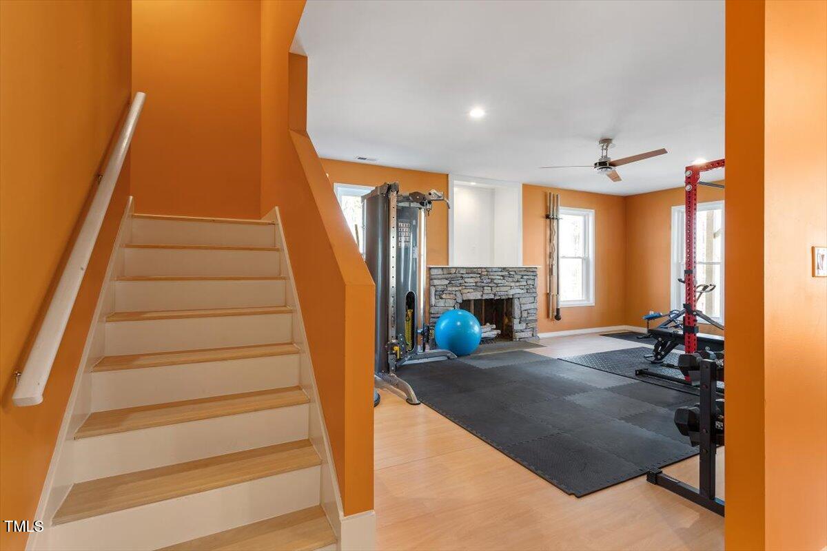 5920 Orchid Valley Road Raleigh, NC 27613 - Photo 42 of 54 Stairs to lower-level living areas