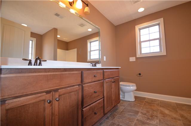 126 Legends Ridge Drive, Unit 20 Lebanon, TN 37090 - Photo 8 of 15 Master bath with double vanities and tile flooring